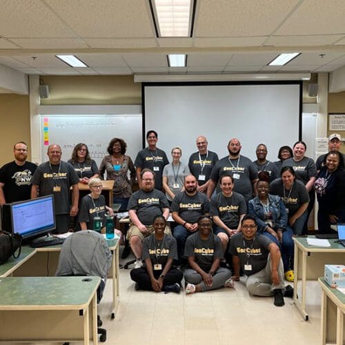 Group of teachers stand together during the Gen Cyber Camp