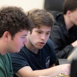 PNW students collaborate in a computer lab
