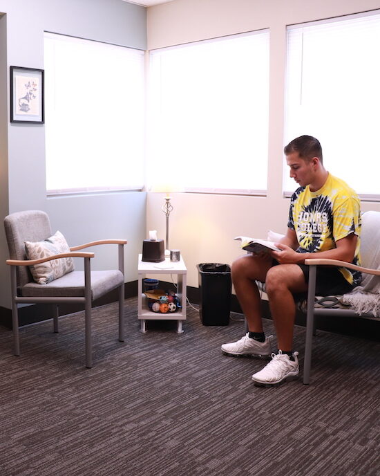 A student waits in the counseling center.