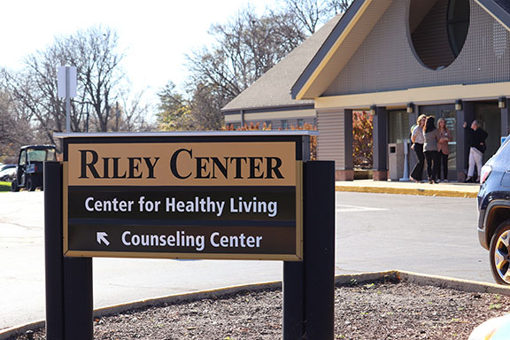 Sign and exterior facade for the Riley Center, including the Center for Healthy Living and Counseling Center