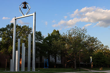 Purdue University Northwest bell tower landmark between Lawshe Hall, Student Union Library Building and Nils Bioscience Building.