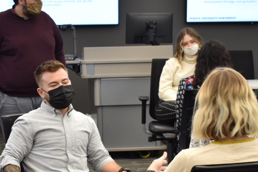 Professor teaching class during roleplay, walking around