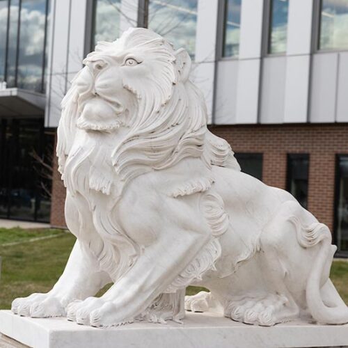 A lion sculpture outdoors on Purdue University Northwest's Hammond campus.