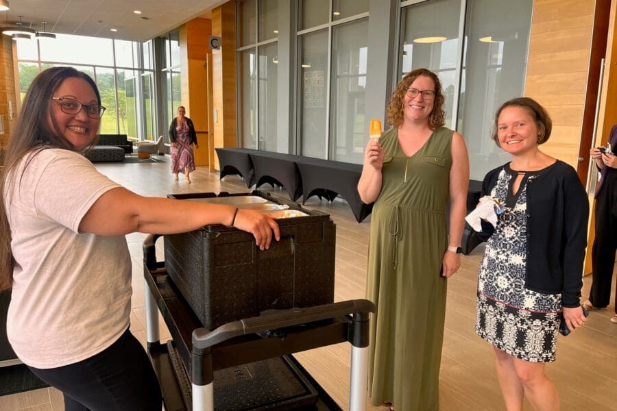 Staff Poses at Ice Cream Social Event