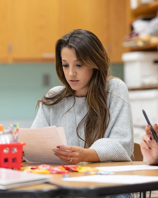 A student studies in a classroom