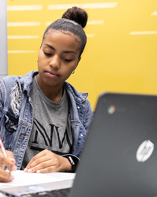 A student works on a computer