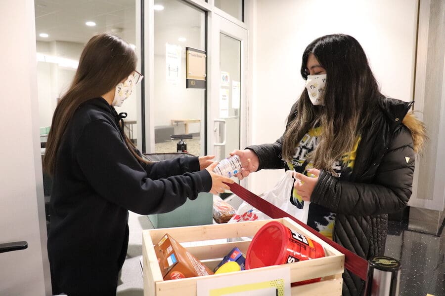 Students at the food pantry are pictured.