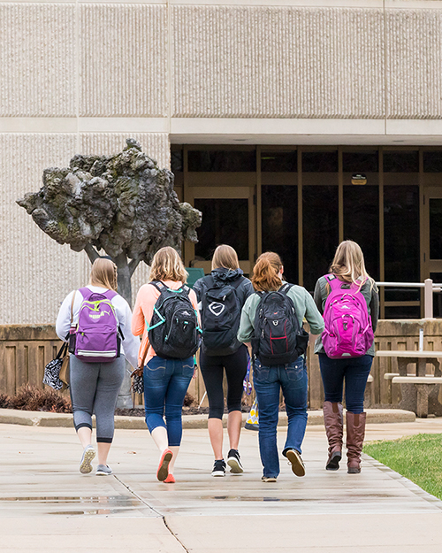Students on campus are pictured.