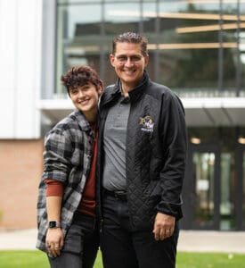 PNW Student standing with their parent