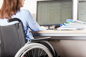 Student in a wheelchair using a computer