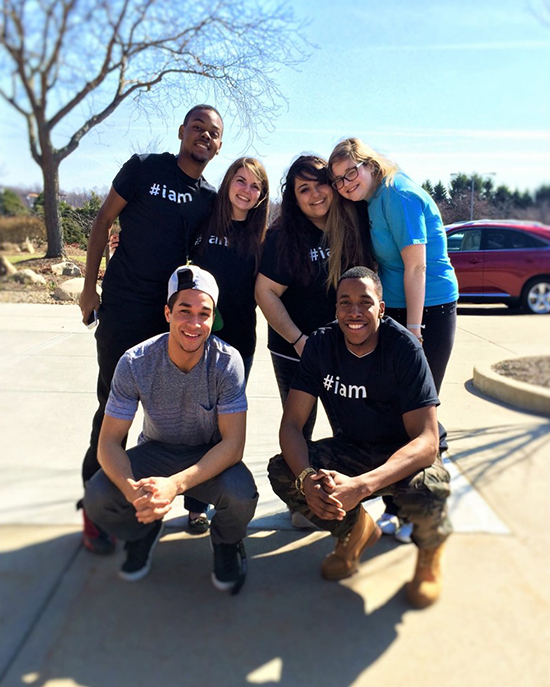 Group of TRIO students gathered outside on a sunny day