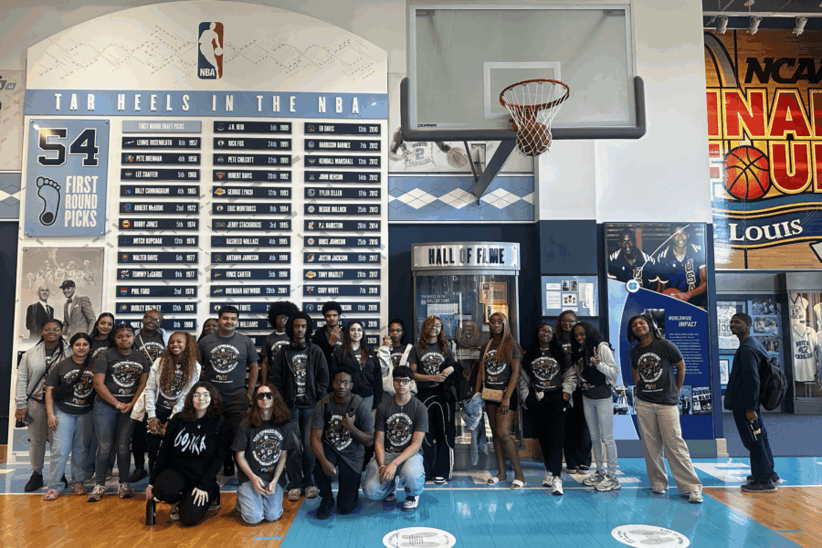 A large group of students in a basketball museum