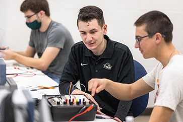 PNW students work together in the lab