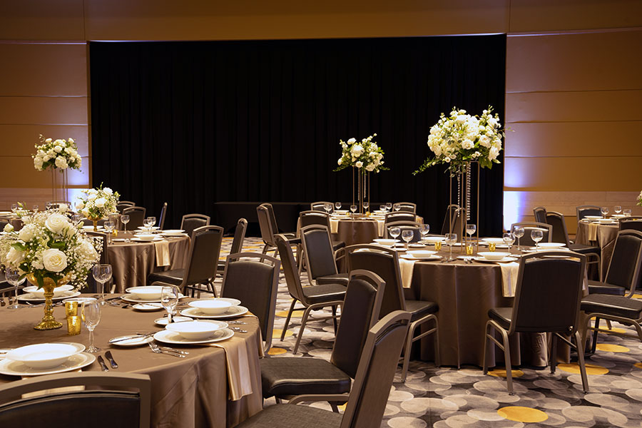 Tables decorated for an event at the Great Hall Events and Conference Center