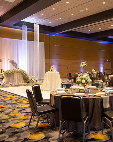 Tables decorated for an event at the Great Hall Events and Conference Center