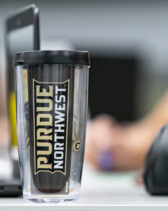 A branded PNW cup is pictured.