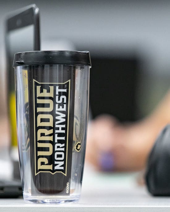 A branded PNW cup is pictured.