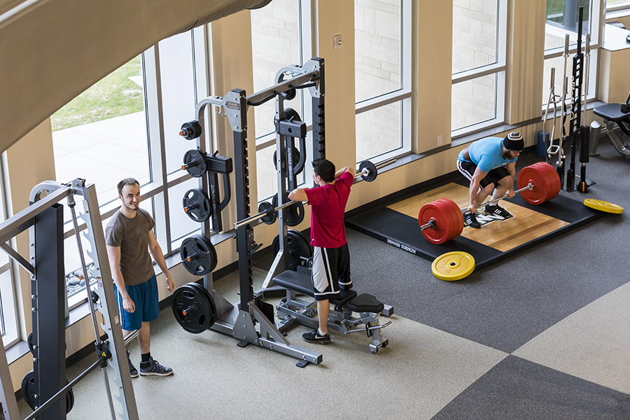 Students lift weights in PNW's Dworkin Student Services and Activities Complex.