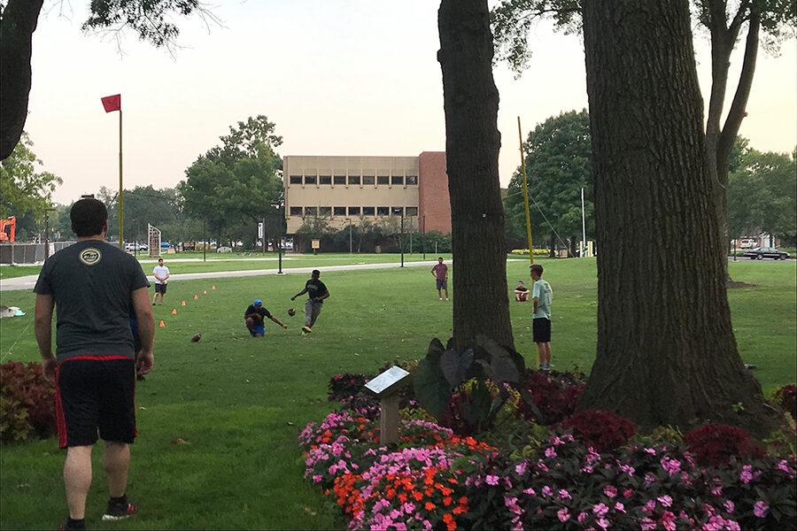 Students kicking field goals