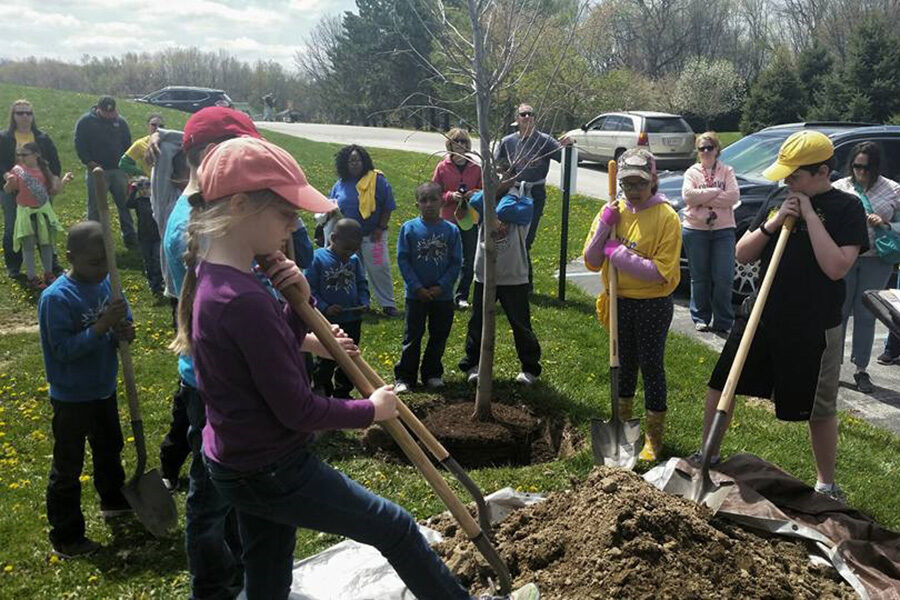 Gabis volunteers dig for Arbor Day