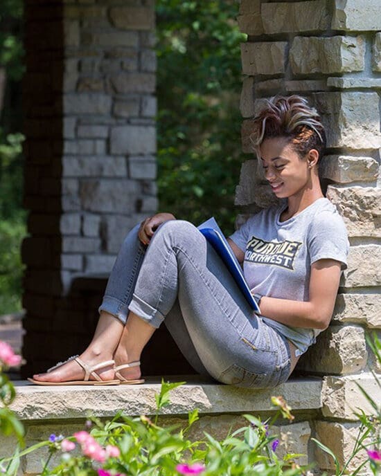 A PNW student at Gabis Arboretum