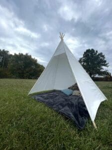 tent with pillows and blankets