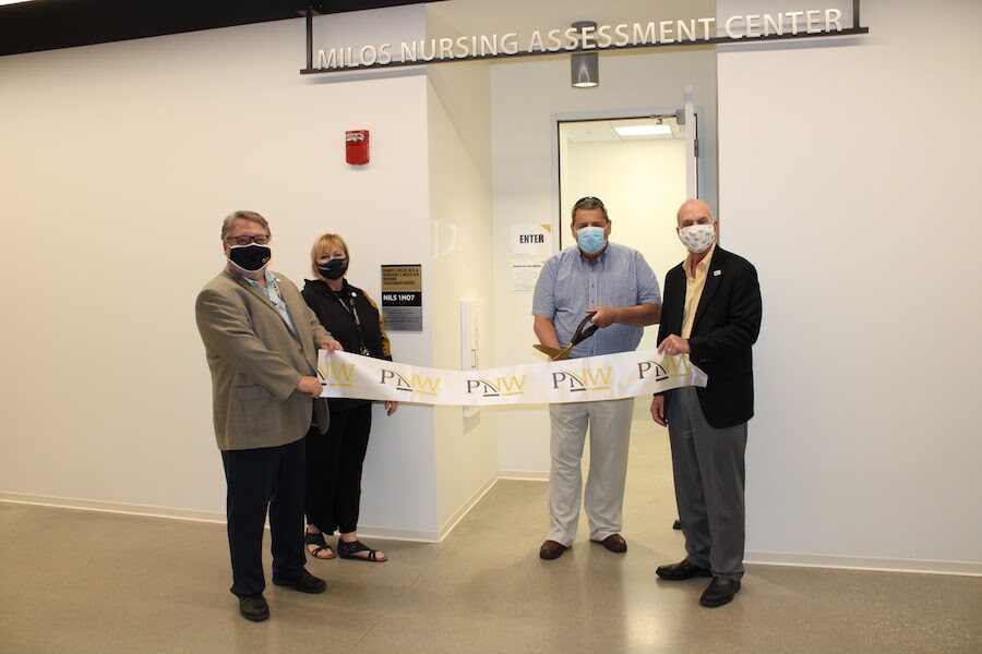 Ribbon cutting is pictured.