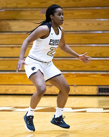 A PNW women's basketball player on the court.