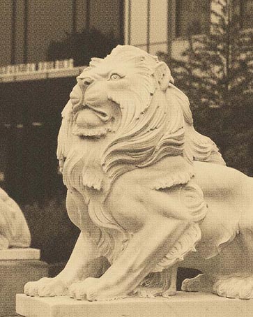 Photo of a Lion Sculpture with a Gold Overlay