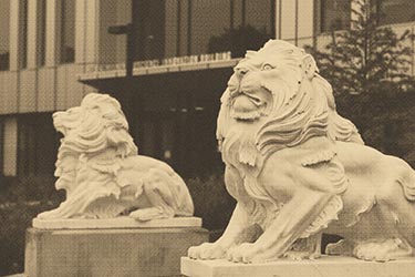 Photo of a Lion Sculpture with a Gold Overlay