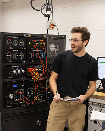 A graduate student works in a lab