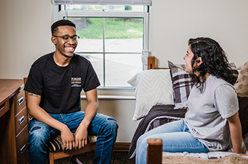 Students laugh in PNW housing