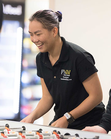 PNW students plays foosball