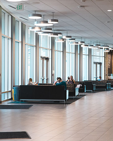 People sit on couches on the Westville Campus