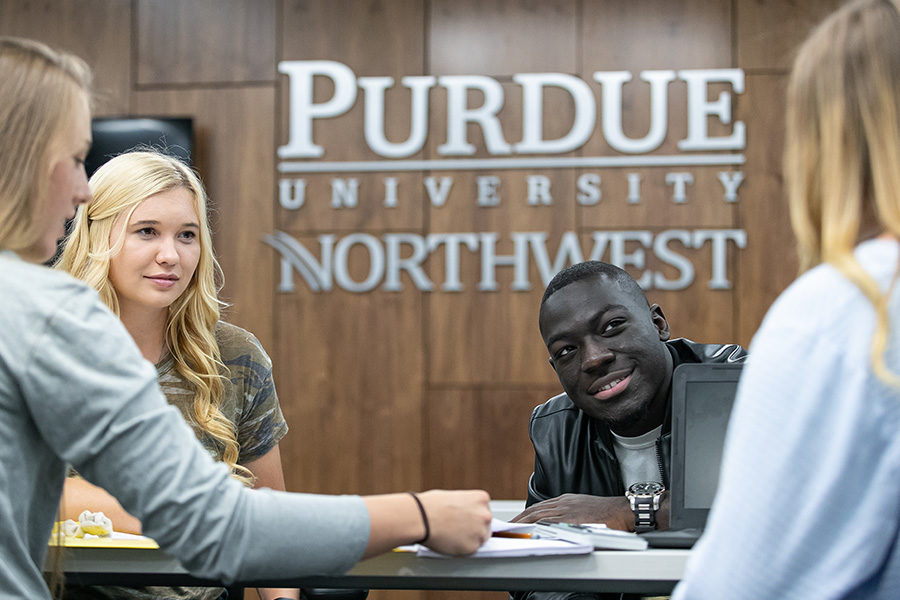 Students in a Purdue University Northwest conference room