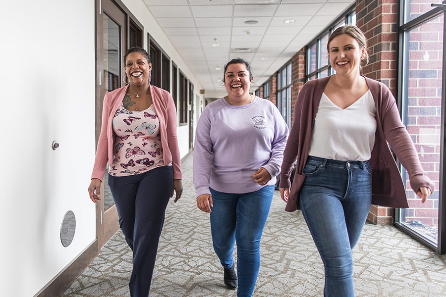 Students walk down a hallway at Purdue University Northwest