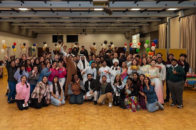 Students pose in a group during Global Groove