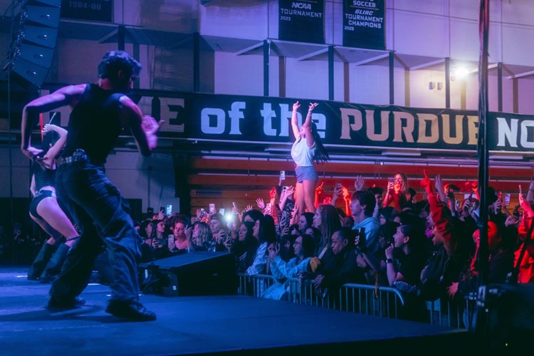 PNW students cheering and singing during the Daya performance at Roaring Loud.