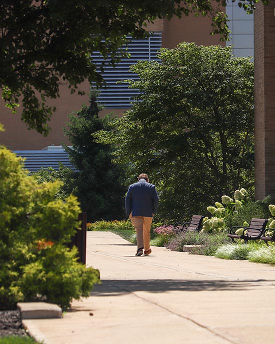 A person walking on the Westville PNW Campus