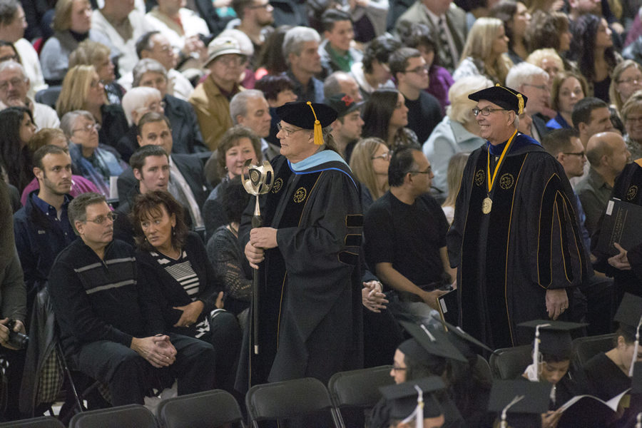 Professor David Pick (left) and Chancellor Thomas L. Keon making their way to the stage