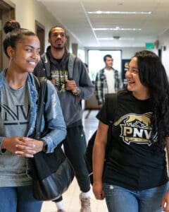 Purdue Northwest students walk down a hall