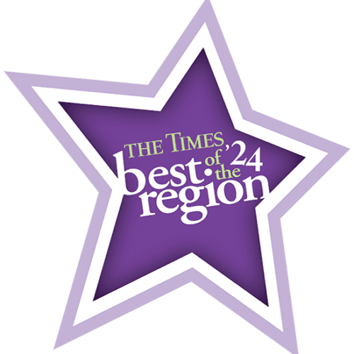 A purple star with text inside saying The Time best of the region '24.