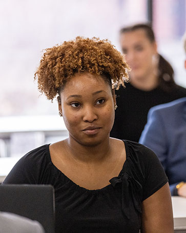 A Student smiles during class