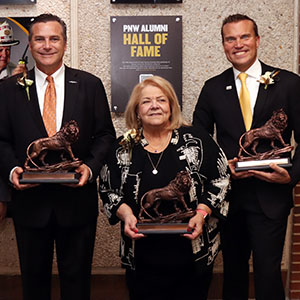 PNW Chancellor Holford Poses with 2024 Alumni Hall of Fame inductees Hammond Mayor Thomas McDermott Jr., the Honorable Diane Kavadias Schneider and Jeff Strack, president and CEO of Indiana Grocery Group