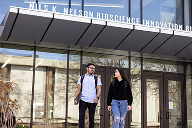 PNW students outdoors the Nils K. Nelson Bioscience Innovation Building