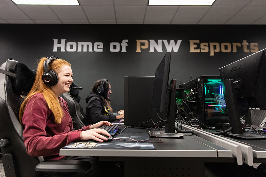 Students sit at desktop gaming stations in the PNW Esports Arena.