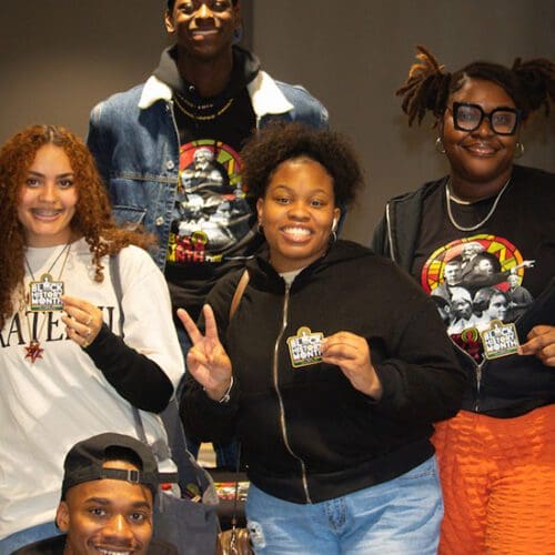 Five students pose together during the Black History Month Launch Party