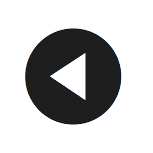 A solid black circle with a white, left pointing triangle in the center