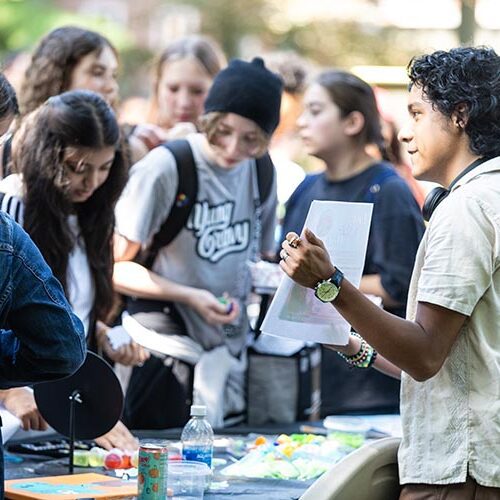 Hammond Welcome Rally - students looking at the organization tables 750x500