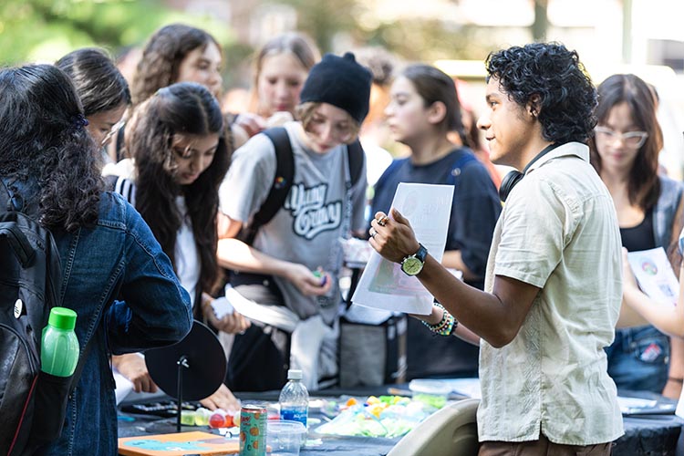Connect with your fellow students and discover resources and organizations across our campuses. Hammond Welcome Rally - students looking at the organization tables 750x500